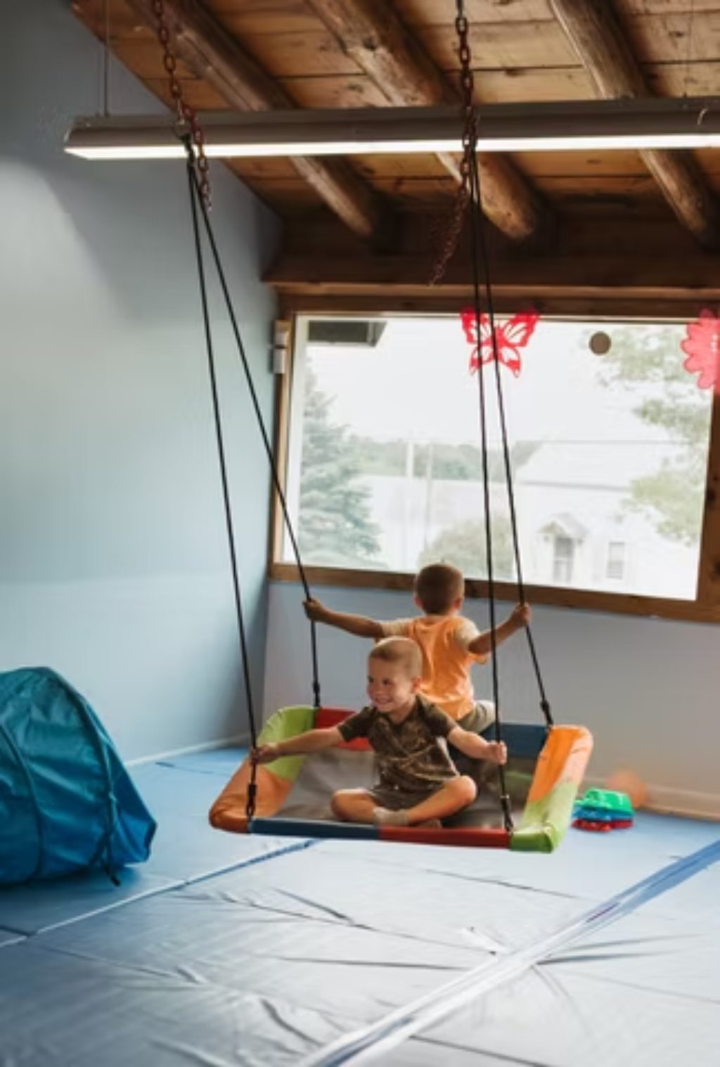 Children playing in soft indoor play area