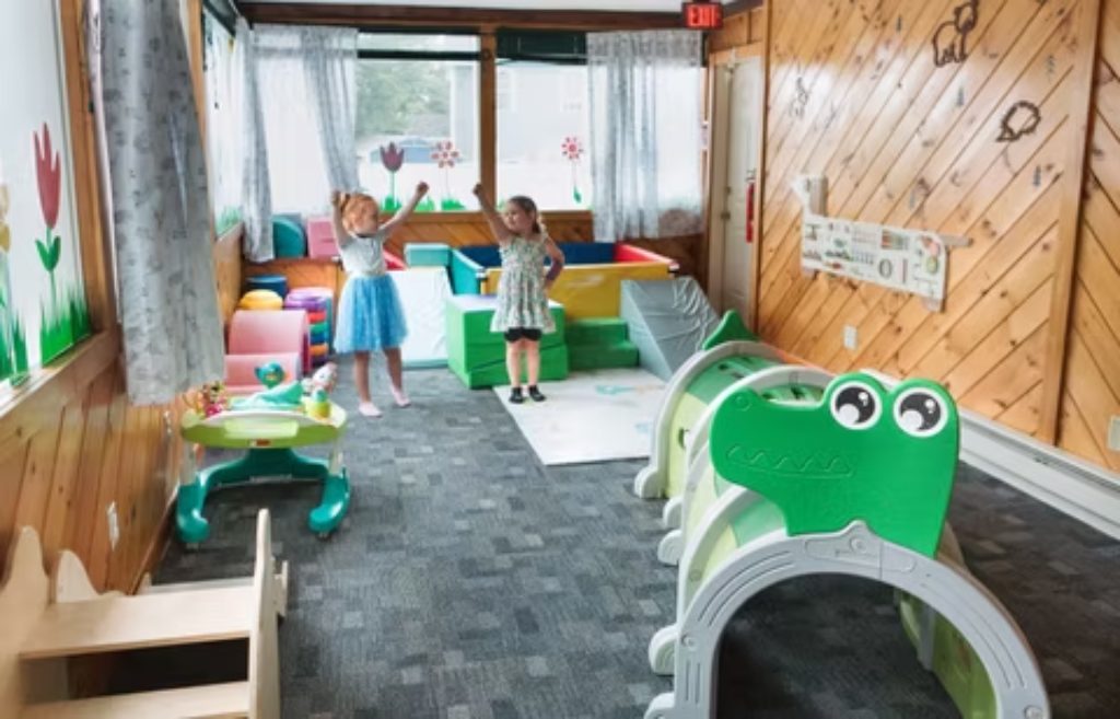 Children playing in soft indoor play area